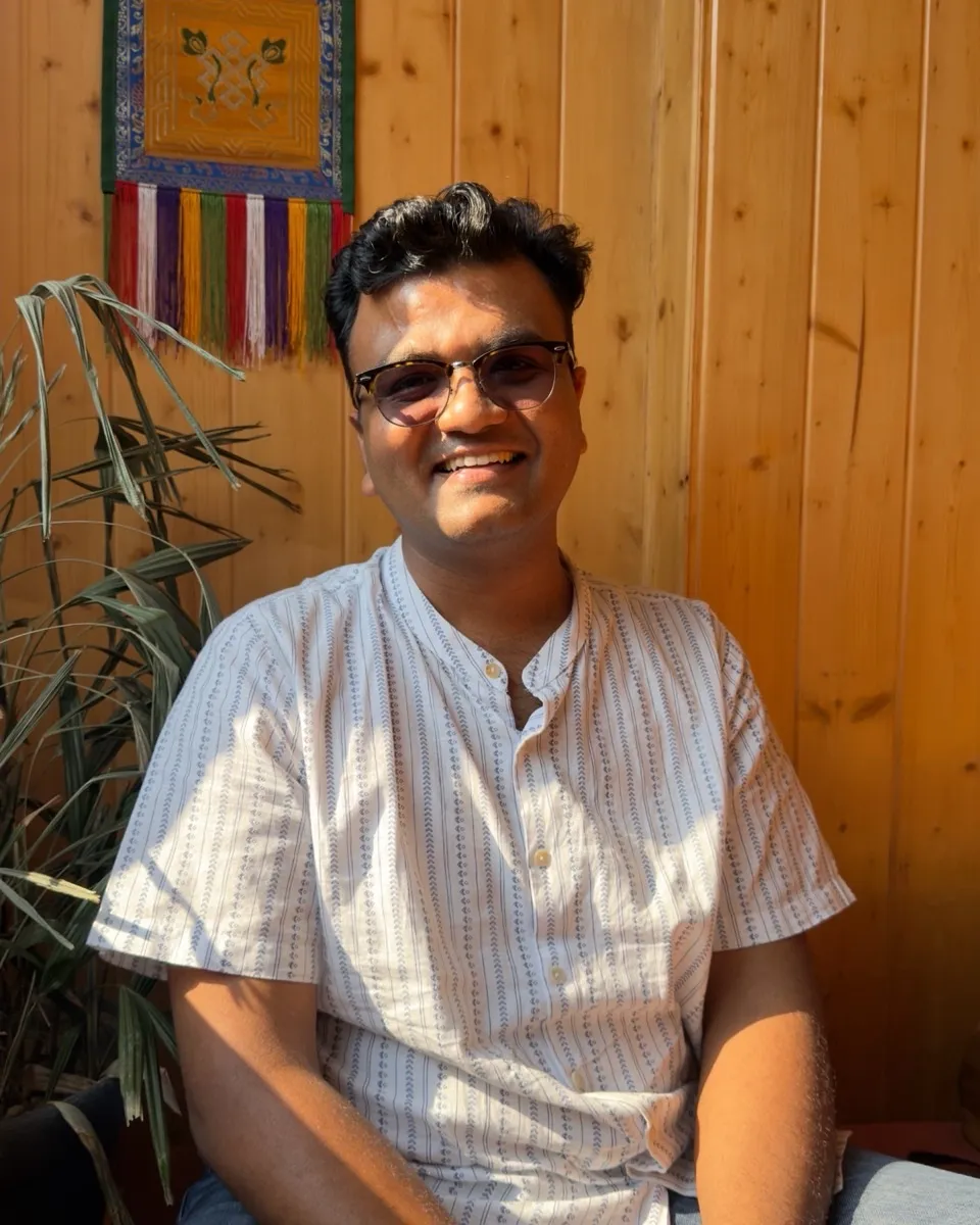 Pancham Khaitan smiling in warm light